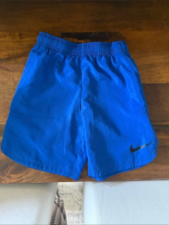 Nike Royal Blue Kids Athletic Shorts with Black Swoosh
