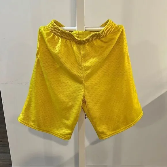 Starter size 10/12 youth boys yellow athletic shorts.