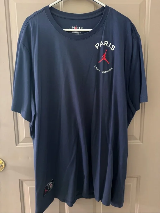 Jordan Men’s Navy Short Sleeve PSG Logo Tee with Red Jumpman