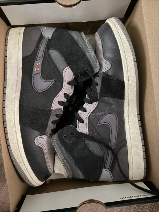 Jordan Men's Black and Gray High-Top Sneakers with Subtle Pink Accents