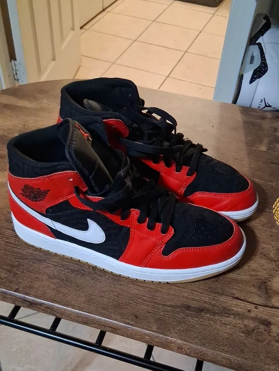 Jordan Black and Red Mid-Top Sneakers with White Swoosh