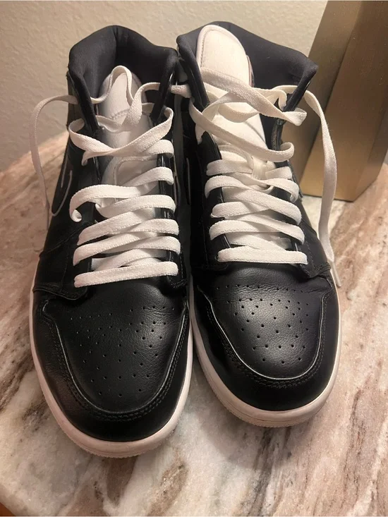 Jordan Black and White High-Top Sneakers
