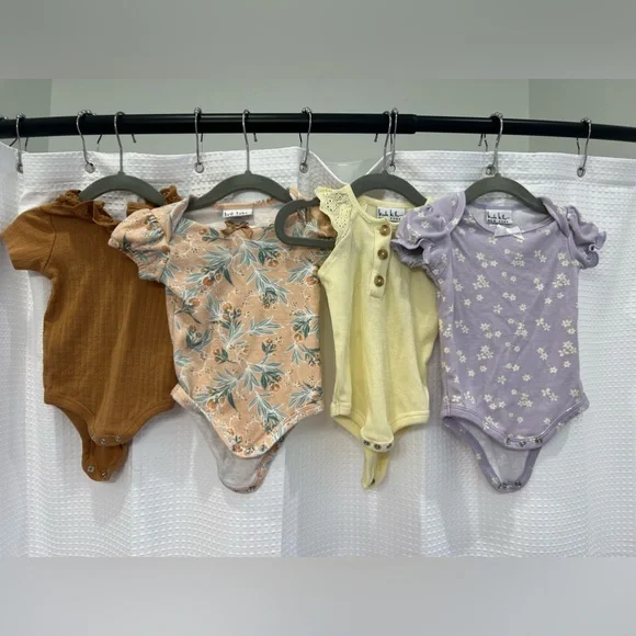Bundle of 4 Nicole Miller New York Onesies size 6-9M