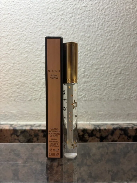 Gucci Clear Lip Gloss with Gold Star Accents