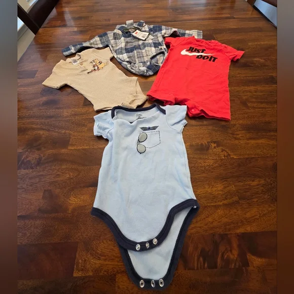 Baby One Piece Lot Of 4 Onesies‎ Nike 3/6 Months.           Bin25