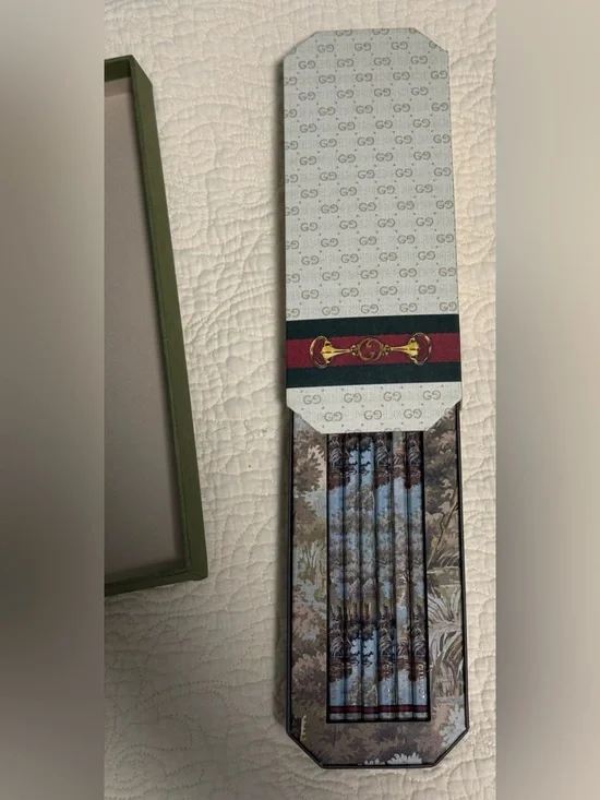 Gucci NIB Decorated pencil set in storage Container! With COA!