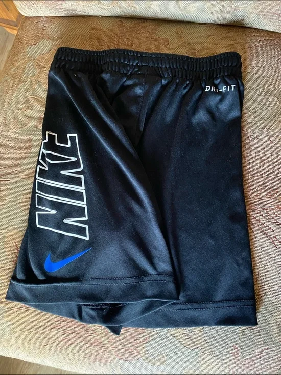 Nike Black Athletic Shorts with White Logo and Blue Swoosh