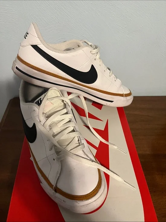 Nike White Kids Sneakers with Black Swoosh and Brown Trim