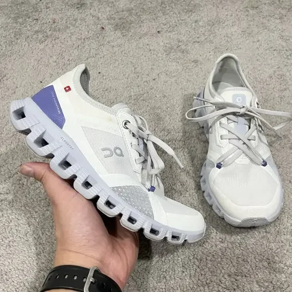 On Running Cloud Athletic Shoes in White with Light Purple Accents