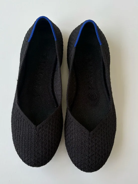 Rothy's Black Knit Ballet Flats with Blue Heel Trim. Womens size 7.5
