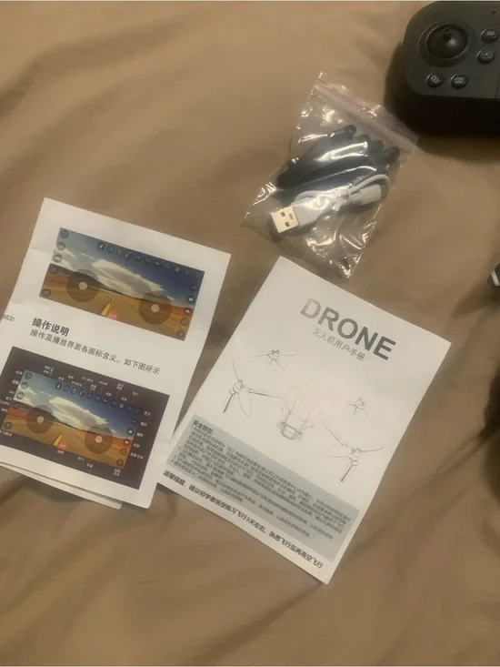 Black VR/Drone Controller with USB Cable and Spare Propellers