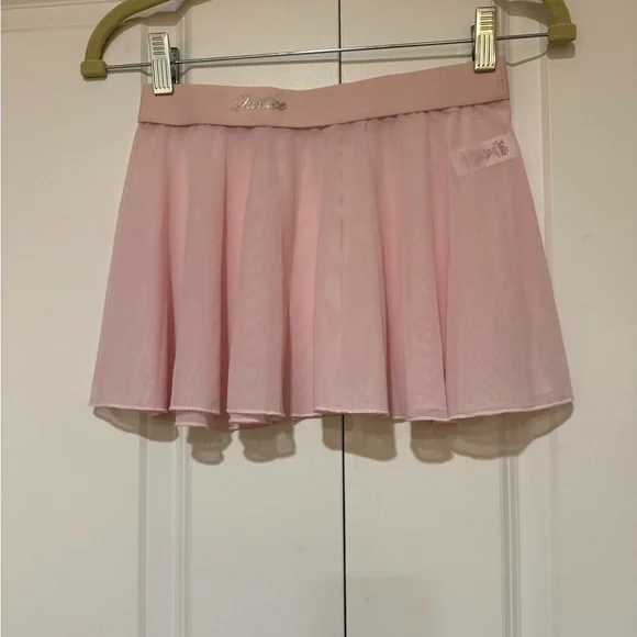 Justice Light Pink Mini Skirt sz XL Girls