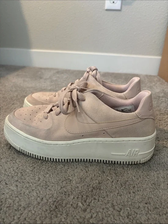 Nike Women’s Pink Suede Platform Sneakers