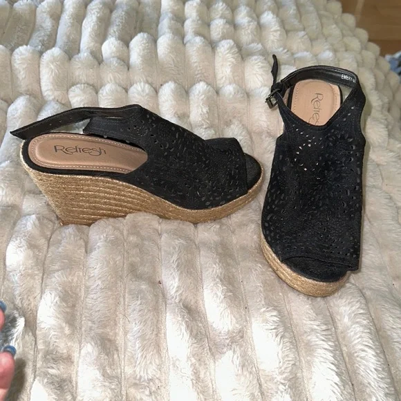 Size 7 never worn, black wedge, adjustable straps shoes
