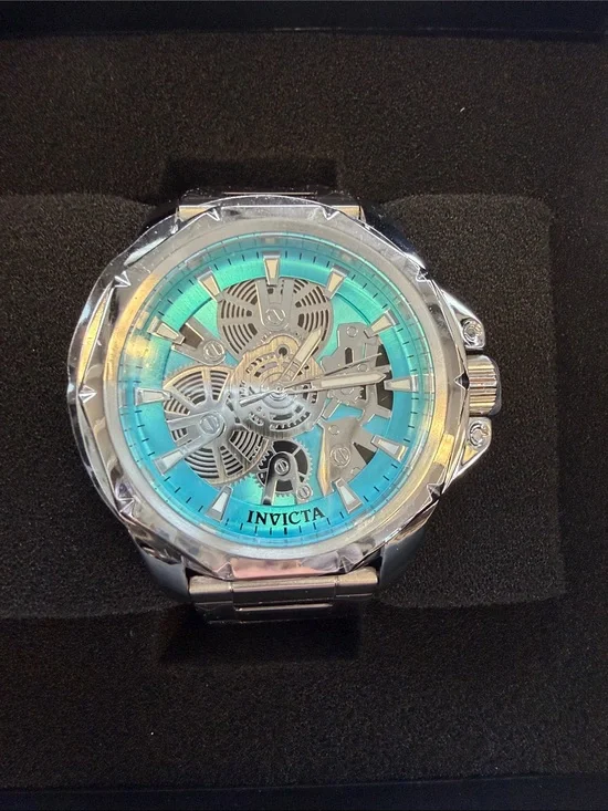 Invicta Silver Watch with Turquoise Dial and Skeleton Movement