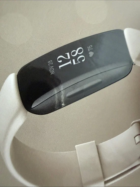 Fitbit Fitness Tracker Smart Band - Beige New in box, comes with extra strap.