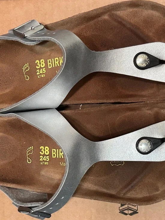 Birkenstock Gizeh thong sandals in silver, featuring a metallic Birko-Flor upper