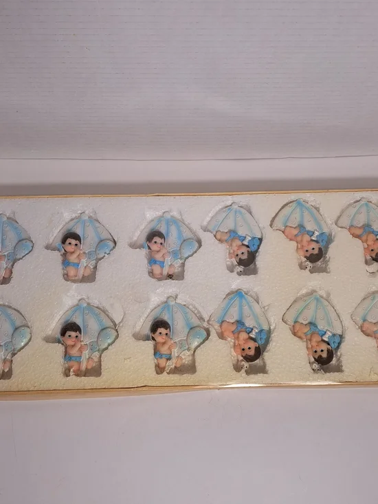 Blue Baby Ceramic Figurines with a Magnet on the back. Great for Baby Shower