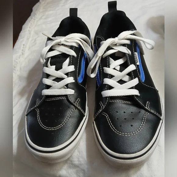 Vans Black Sneakers with Blue Accents and White Laces