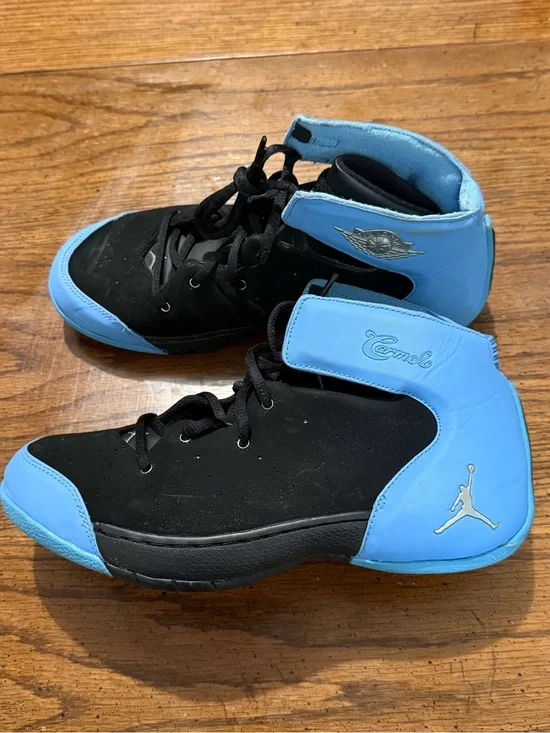 Kids Nike Melo 1.5 shoes black/university blue.