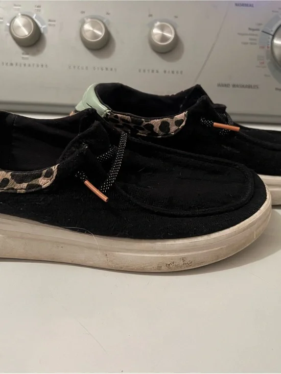 Hey Dude Black Slip-On Sneakers with Leopard Trim and Mint Heel