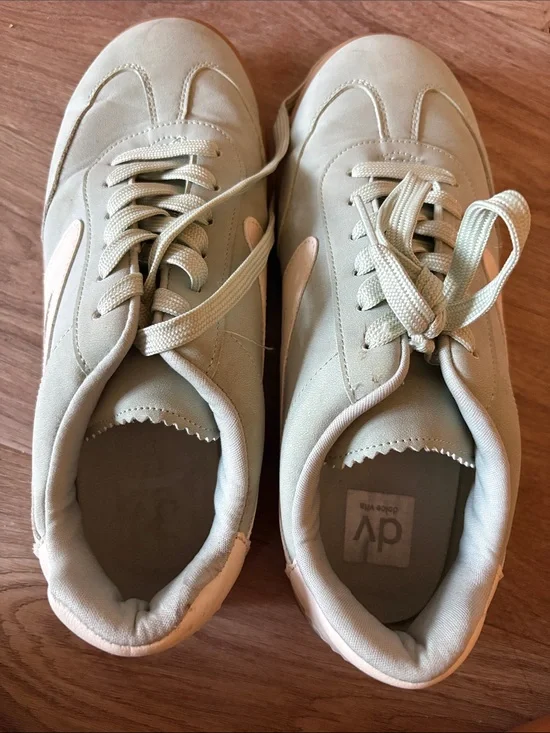 Casual mint green Sneakers with Subtle white Accent