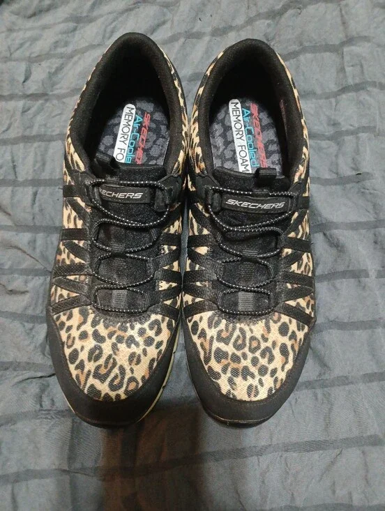 Skechers Leopard-Print Slip-On Sneakers in Black and Tan