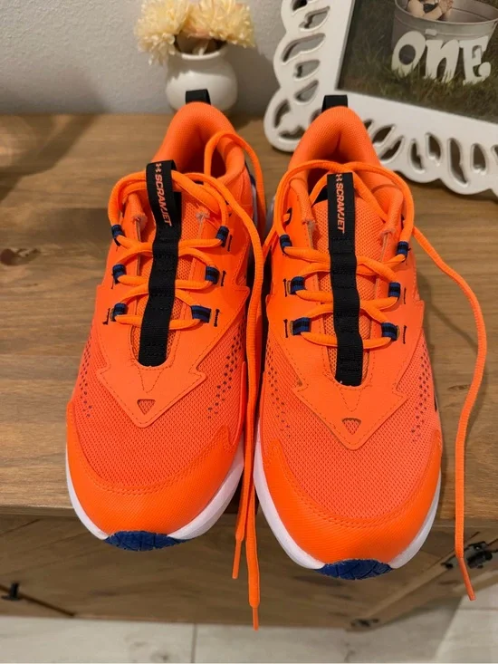 Under Armour Bright Orange Kids Sneakers with Black Accents