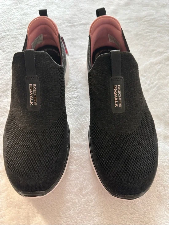 Skechers Women’s Black Glimmer Slip-On Sneakers with Pink Lining