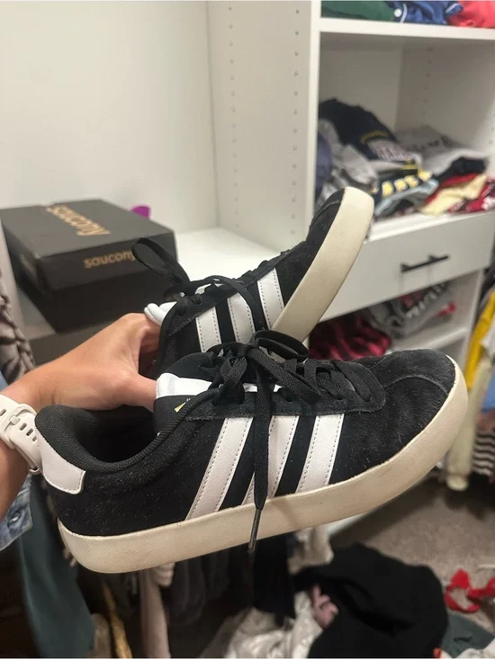 Women’s black adidas sneakers