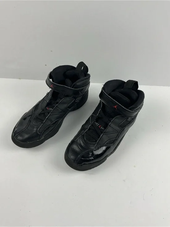 Jordan Black Kids' High-Top Sneakers with Red Jumpman Accents they need inserts