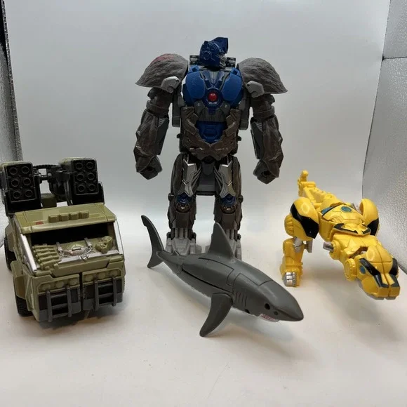 Lot Of 4 Mixed Year Transformers READ