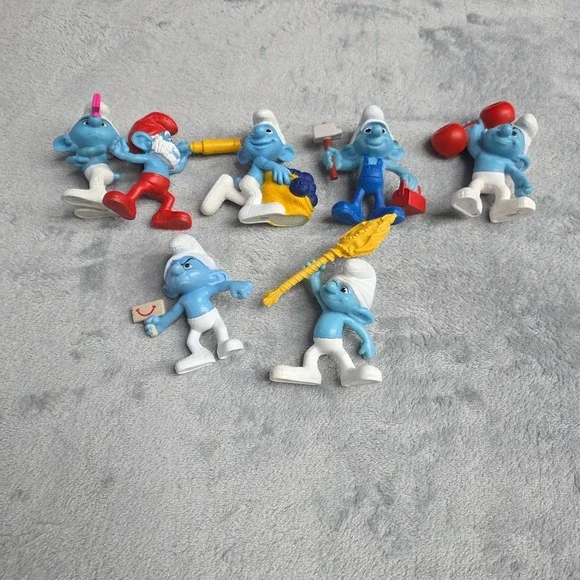 LOT OF 7 VINTAGE THE SMURFS‎ COLECTIBLE FIGURINES FROM MCDONALDS