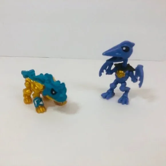 treasure x gold mini dino’s action‎ figures dactyl purple and blue