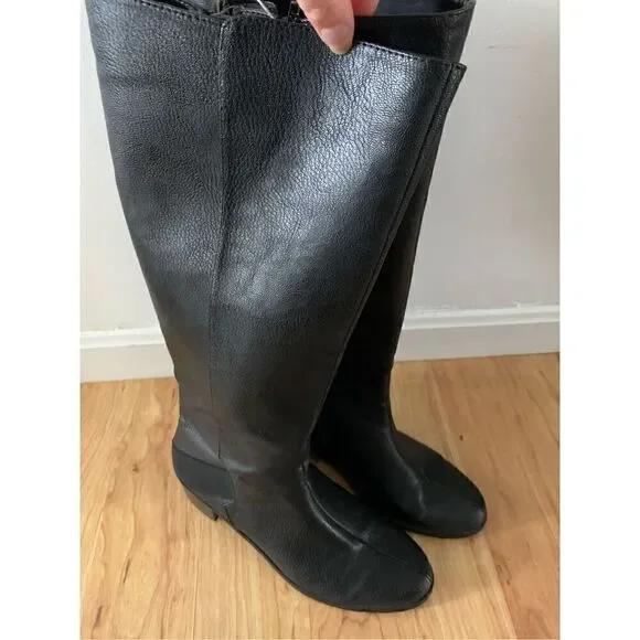 Black riding boots, size 9.5with expendable calf