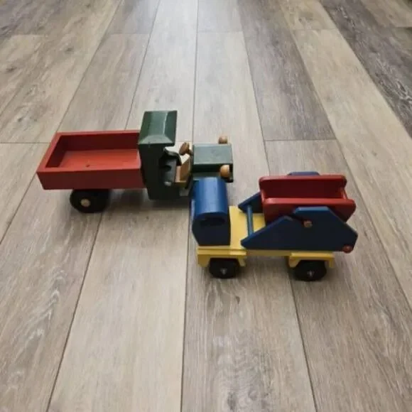 2 vintage Romania toy wooden trucks colorful, moving parts collectible
