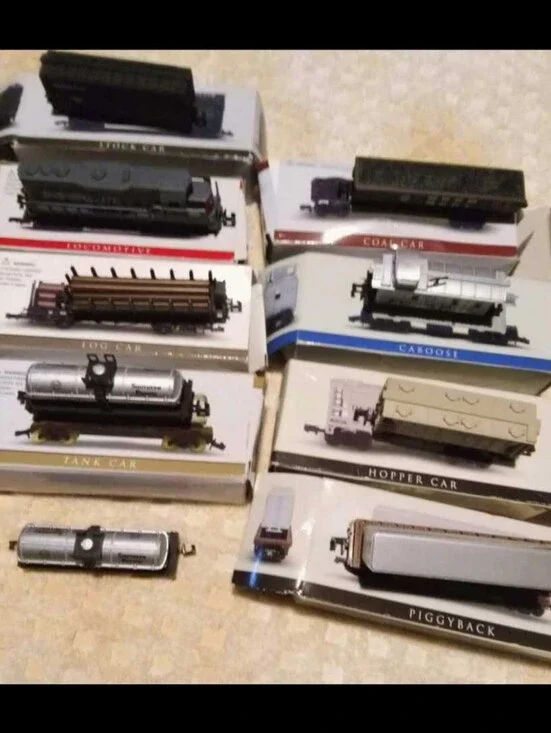 Assorted Model Train Freight Cars - Gray and Silver