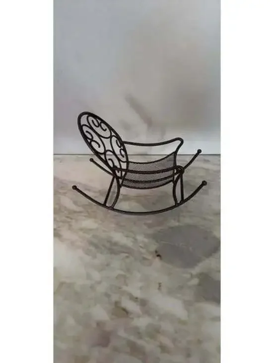 Vintage miniature wire mesh dollhouse rocking chair with scrollwork back