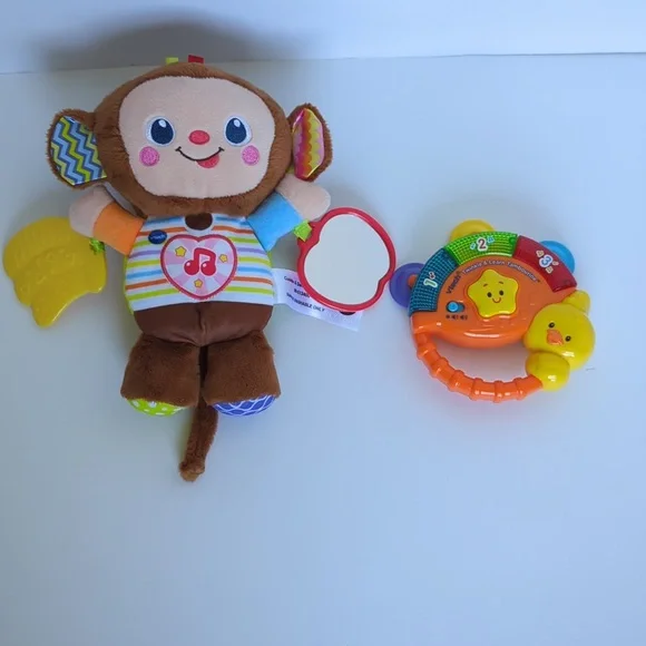 VTech baby toys cuddle and swing monkey twinkle and learn tambourine music talk