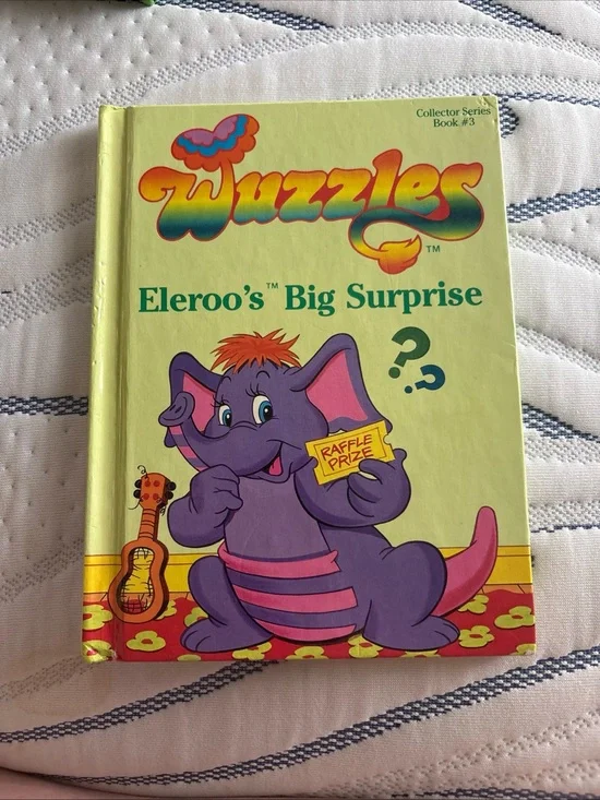 Wuzzles: Eleroo’s Big Surprise Hardcover Book - Yellow & Purple