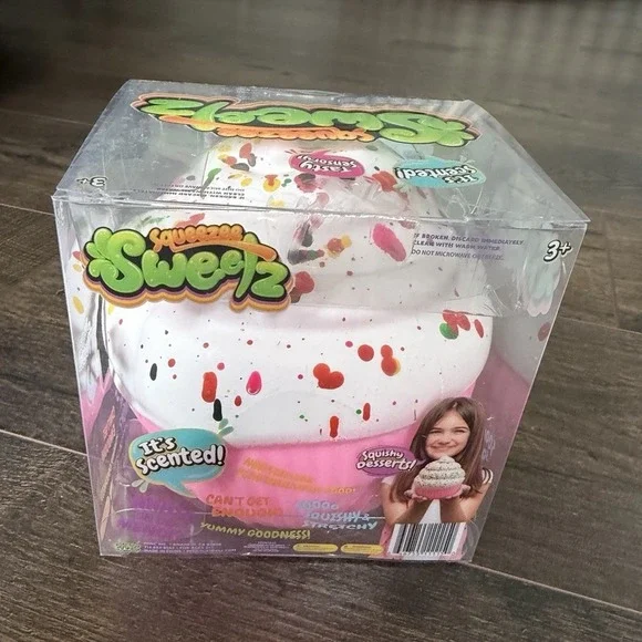 Squeezee Sweetz Scented Dessert Squishy Squeeze Toy, White/Pink Multicolor 3+