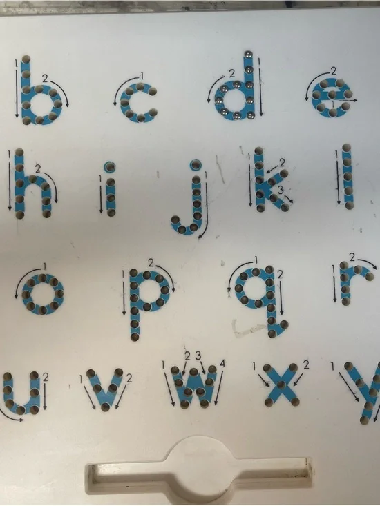 Magnetic ball board to teach/train proper letter formation