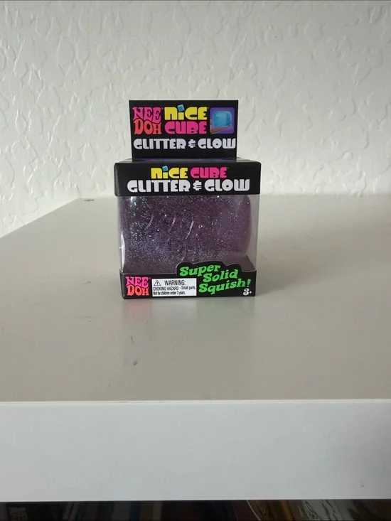 NEW unopened NeeDoh Nice Cube Glitter & Glow. Color purple.