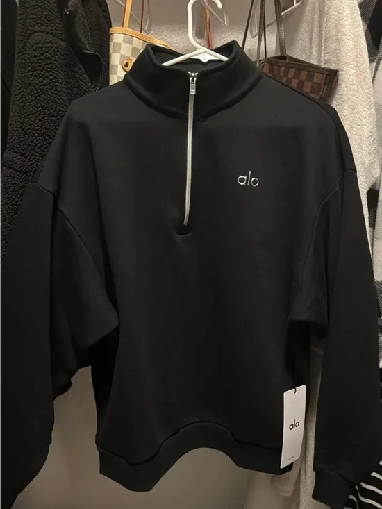ALO Yoga women’s Black Half-Zip Pullover with Silver Zip