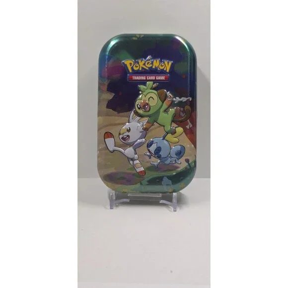 Celebrations Mini Tin RARE card and 25th coin Grookey, Scorbunny & Sobble