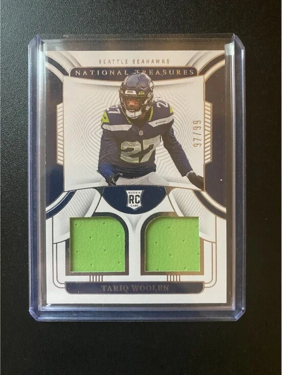 2022 Panini National Treasures - Rookie Dual Materials Tariq Woolen #RDM-TWO /99