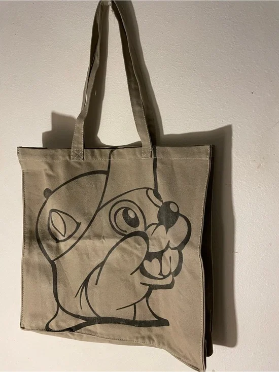 Beige Canvas Tote Bag with Playful Black Cartoon Print