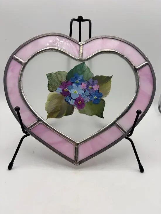 Stained glass heart. With a hand painted floral design.