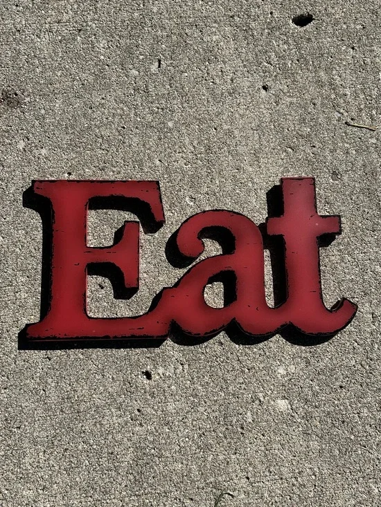 Red 'Eat' Wall Sign