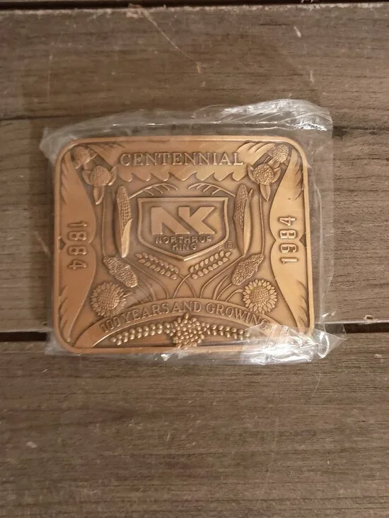 Vintage Northrup King Centennial 1884-1984 Belt Buckle Brand New Sealed